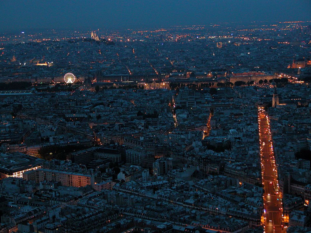 Paris Basilica of the Sacre Coeur 01 View From Montparnasse Tower After Sunset Includes Basilica of the Sacre Coeur, Ferris Wheel at the Tuileries and Louvre 